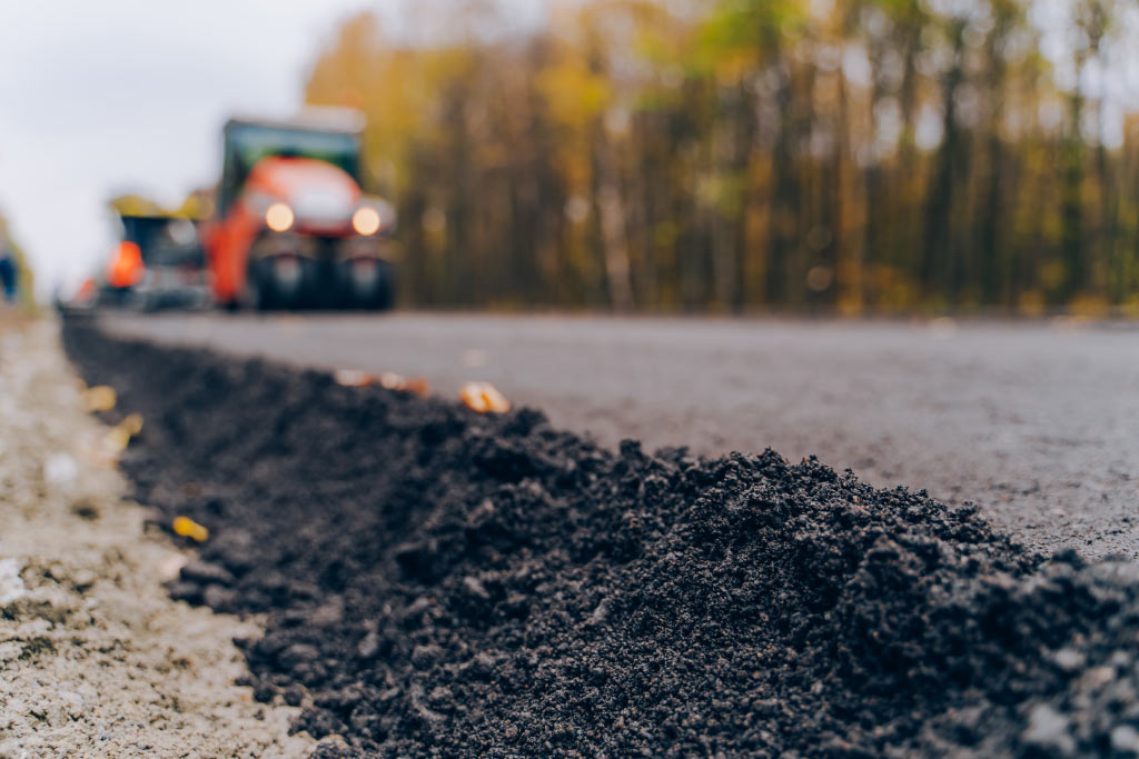 Close-up asphalt at the road under construction.