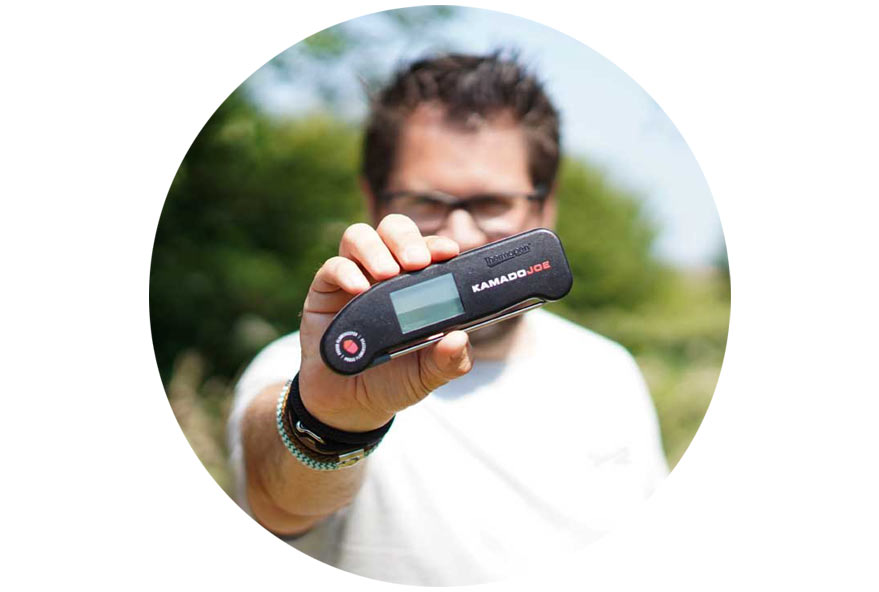 Ben Forte blurred in the background holiding Thermapen ONE custom print with KamadoJoe logo and design