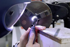 Image of a worker wearing a protective helmet making sensors